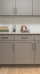beautiful-shot-modern-house-kitchen-shelves-drawers-1